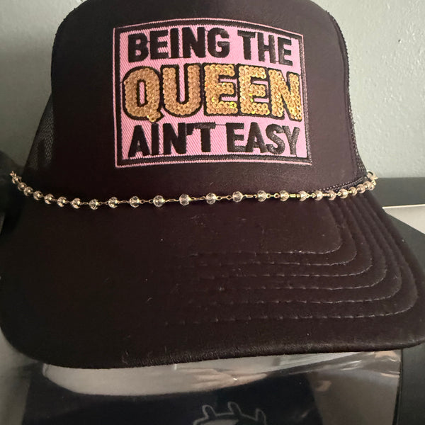 Queen hat. ( All black trucker )